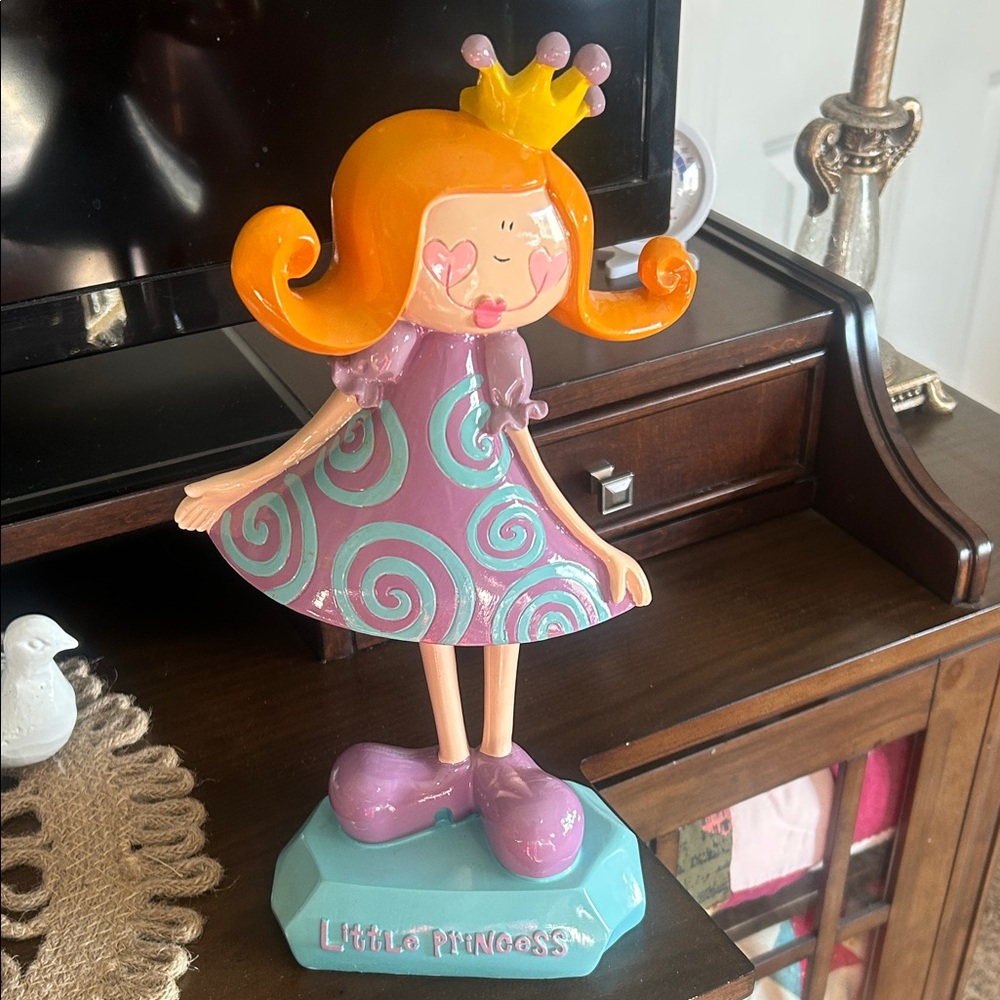 Charming Princess Figurine with Orange Hair and Purple Dress